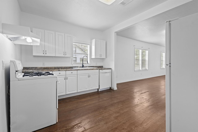 815 N 14th St, Nederland, TX 77627 - kitchen featuring white appliances, a sink, plenty of natural light, and ventilation hood