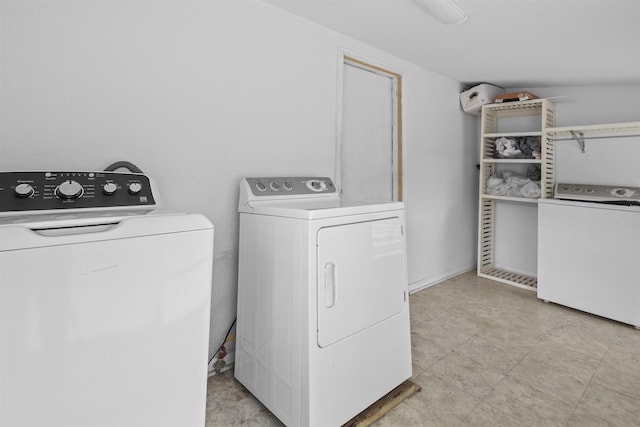 815 N 14th St, Nederland, TX 77627 - washroom featuring separate washer and dryer