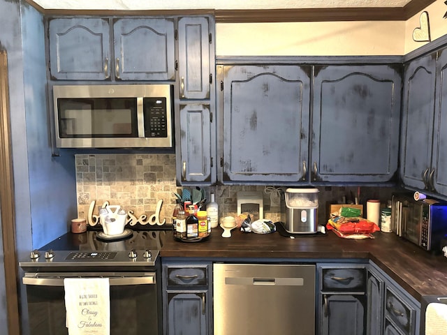 kitchen featuring tasteful backsplash and stainless steel appliances