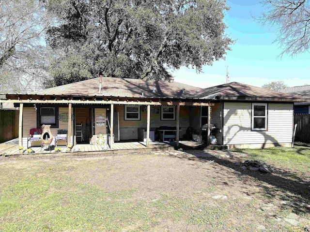 exterior space featuring a patio and a front lawn