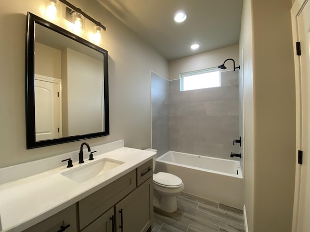 full bathroom with vanity, toilet, and bathing tub / shower combination