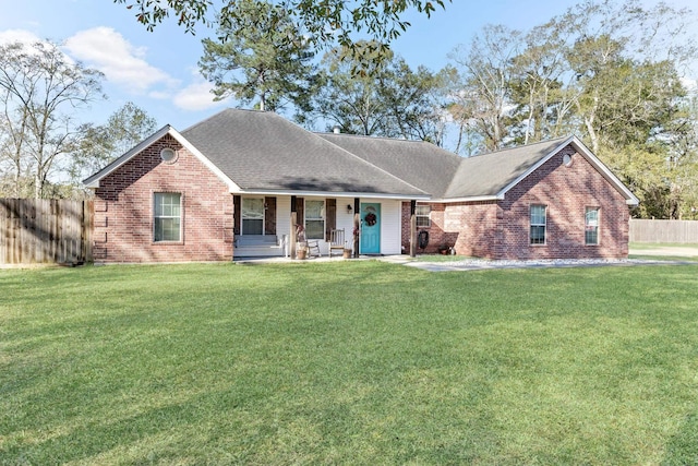 single story home with a porch and a front lawn