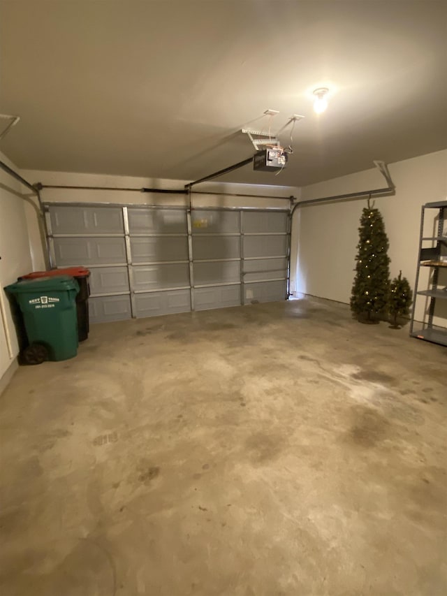garage featuring a garage door opener