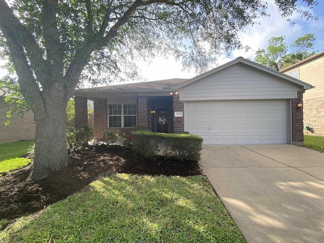 ranch-style house with brick siding, a garage, and driveway