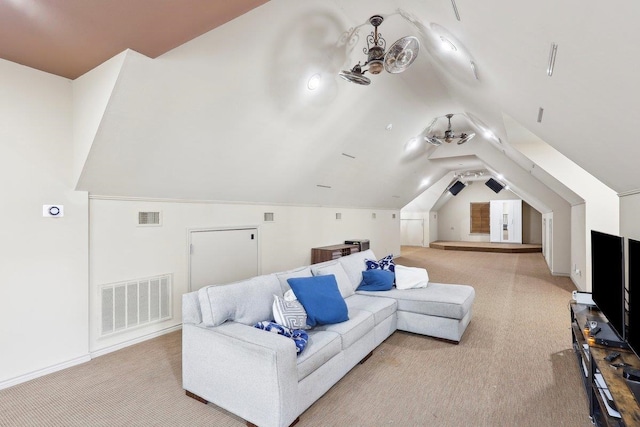 living room featuring lofted ceiling and light carpet