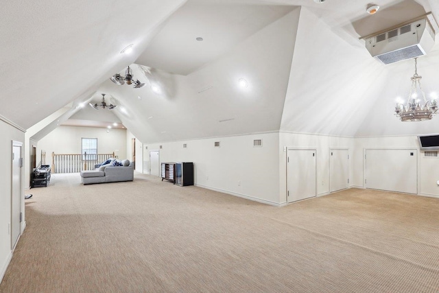 additional living space with lofted ceiling, light carpet, and a chandelier