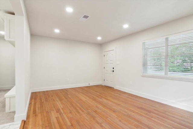 empty room featuring light hardwood / wood-style floors