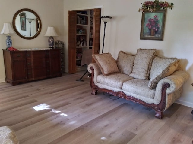 sitting room with light hardwood / wood-style floors