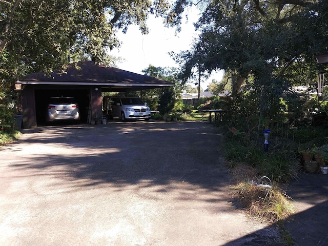 exterior space featuring a carport