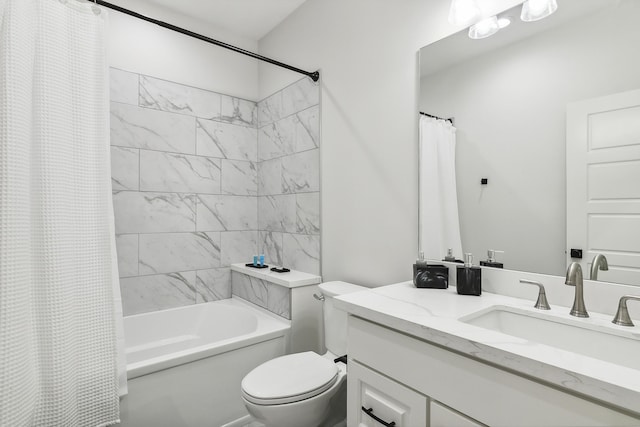 bathroom featuring vanity, toilet, and shower / bath combo with shower curtain