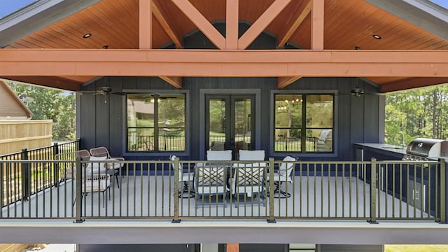 deck with ceiling fan and a sink