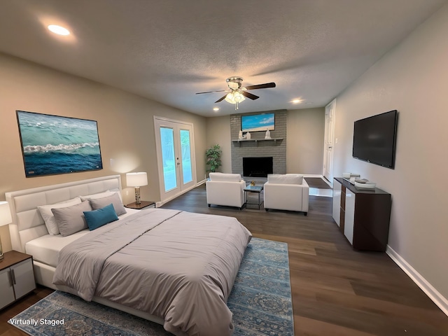 2370 Central Dr, Beaumont, TX 77706 - bedroom with dark wood-style flooring, baseboards, a brick fireplace, access to outside, and recessed lighting