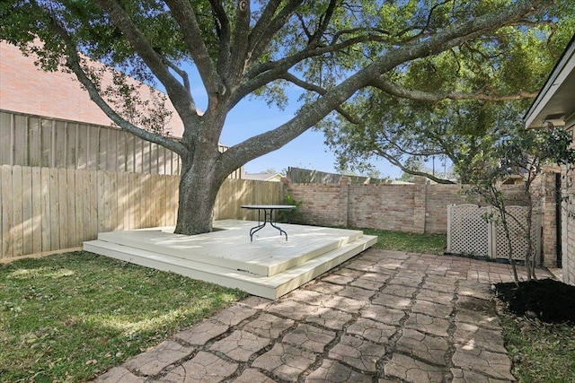 view of patio / terrace featuring a wooden deck