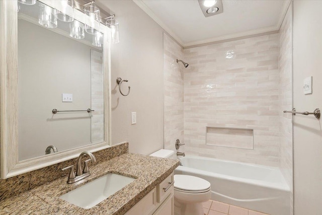 full bathroom featuring ornamental molding, vanity, tile patterned flooring, toilet, and tiled shower / bath