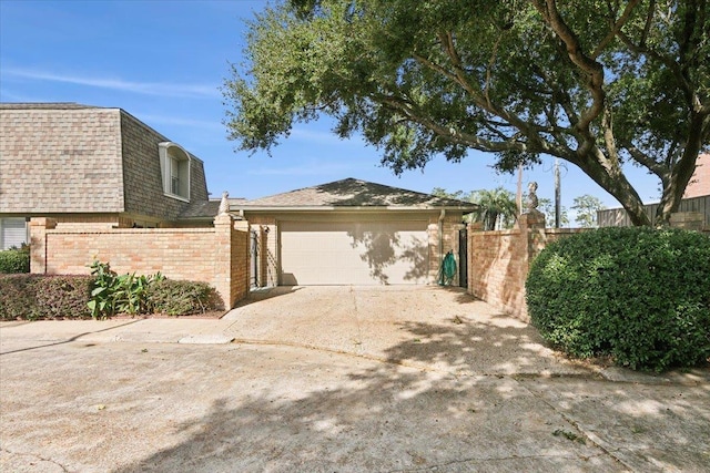 view of side of home with a garage