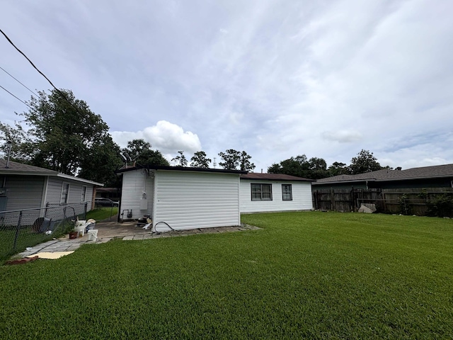 5115 Allen Dr, Beaumont, TX 77708 - back of house featuring a fenced backyard