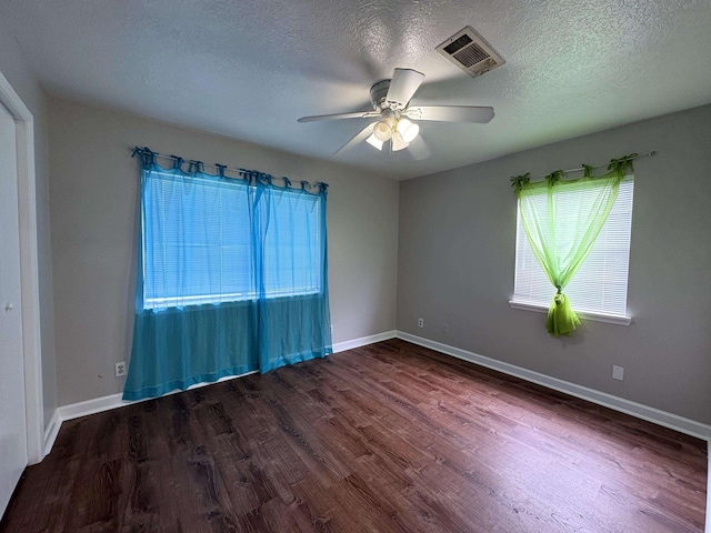 5115 Allen Dr, Beaumont, TX 77708 - spare room featuring wood finished floors, a ceiling fan, and a textured ceiling
