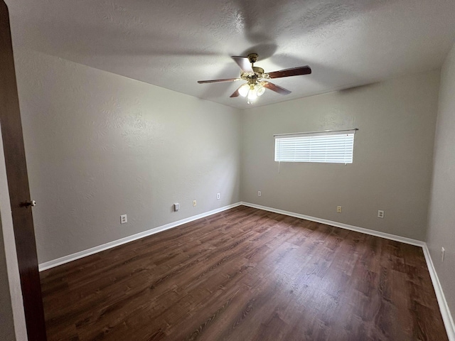 5115 Allen Dr, Beaumont, TX 77708 - empty room featuring a ceiling fan and dark wood-style flooring