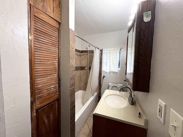 5115 Allen Dr, Beaumont, TX 77708 - bathroom featuring a textured ceiling, shower / bath combo, vanity, a textured wall, and tile patterned flooring