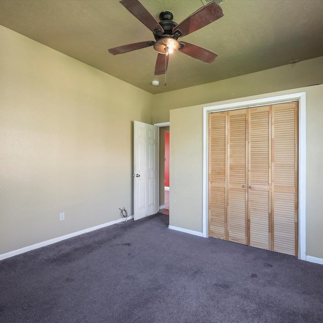 1710 17th St, Port Arthur, TX 77640 - unfurnished bedroom with a closet, baseboards, ceiling fan, and dark colored carpet