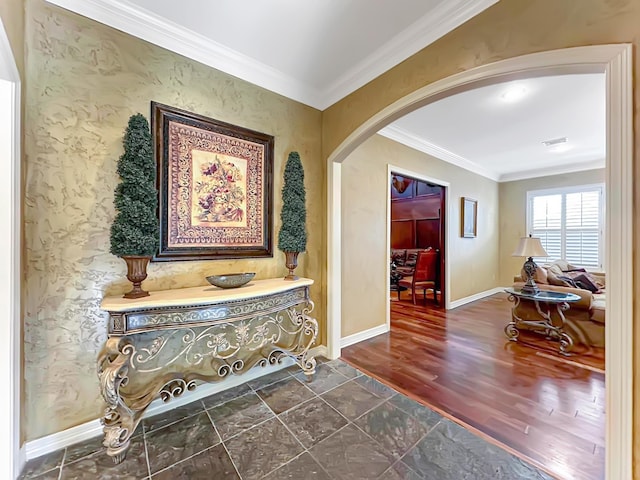 corridor with dark hardwood / wood-style flooring and ornamental molding