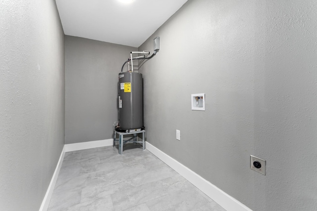 utility room featuring water heater