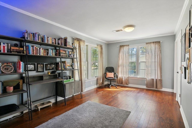 sitting room featuring dark hardwood / wood-style floors, plenty of natural light, and crown molding