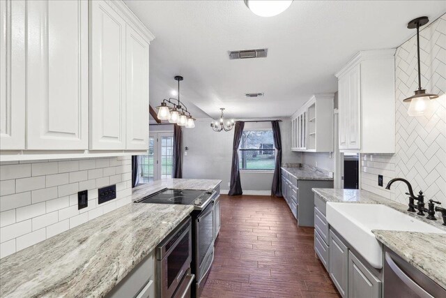 bathroom with walk in shower, hardwood / wood-style floors, and vanity