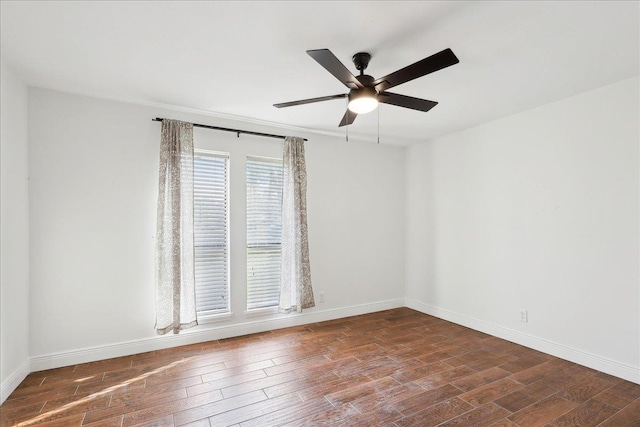 unfurnished room with hardwood / wood-style flooring and ceiling fan