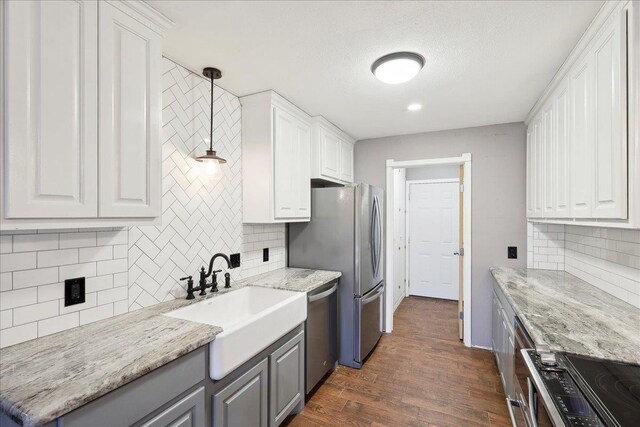 bathroom with ceiling fan, vanity, and hardwood / wood-style floors