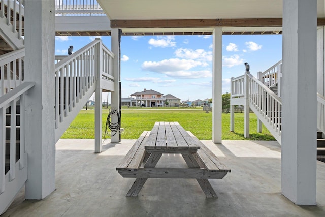 109 Ocean View Dr, Crystal Beach, TX 77650 - view of patio / terrace featuring stairs, a residential view, and a wooden deck
