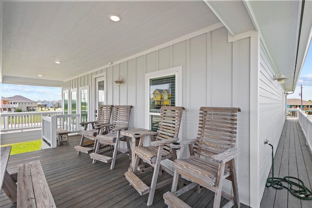 109 Ocean View Dr, Crystal Beach, TX 77650 - wooden terrace featuring covered porch