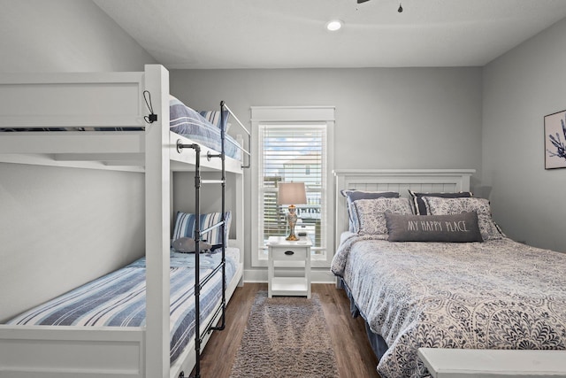 109 Ocean View Dr, Crystal Beach, TX 77650 - bedroom featuring dark wood-style flooring and recessed lighting