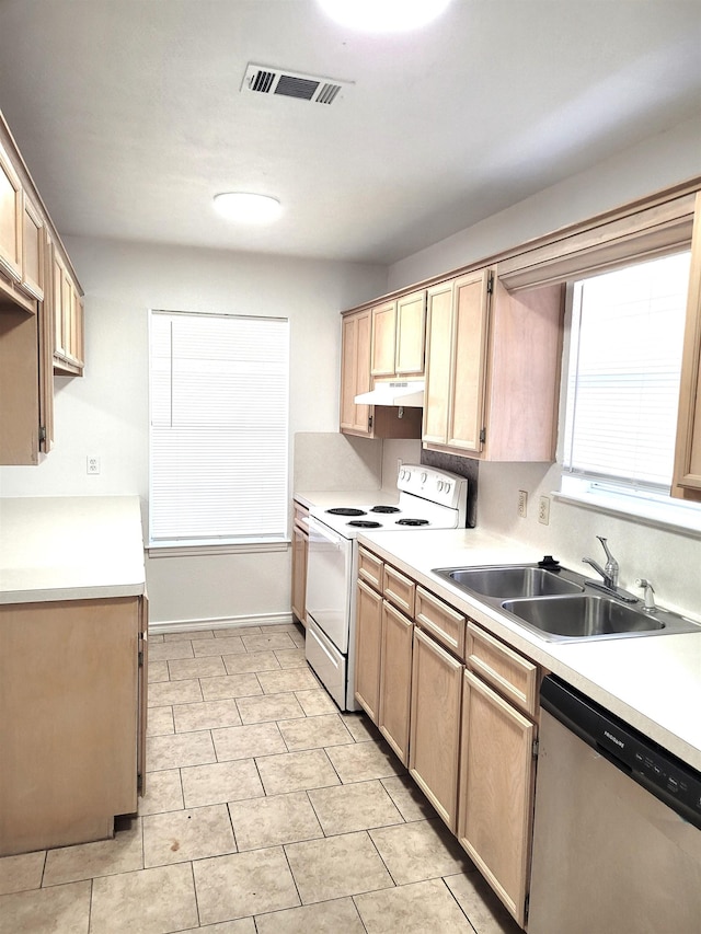 kitchen with light tile patterned flooring, light brown cabinetry, sink, stainless steel dishwasher, and white range with electric cooktop