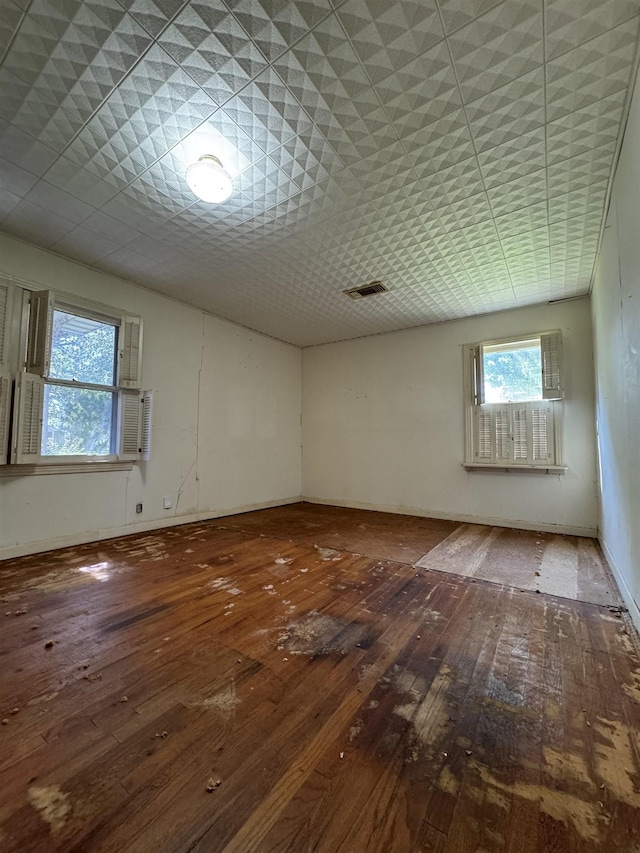 empty room featuring hardwood / wood-style floors