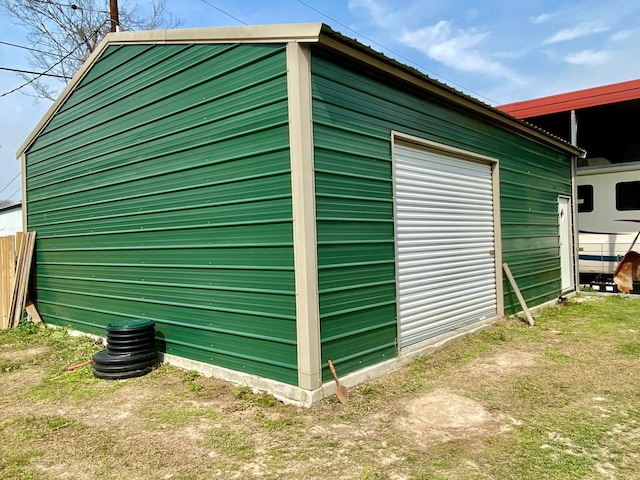 view of outdoor structure with a garage