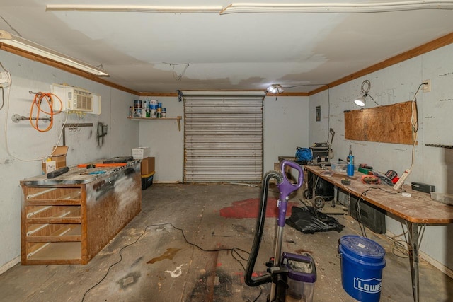 2418 Saba Ln, Port Neches, TX 77651 - garage featuring a workshop area and a wall unit AC