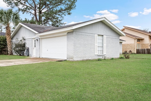 view of side of home featuring a garage, concrete driveway, brick siding, and a lawn