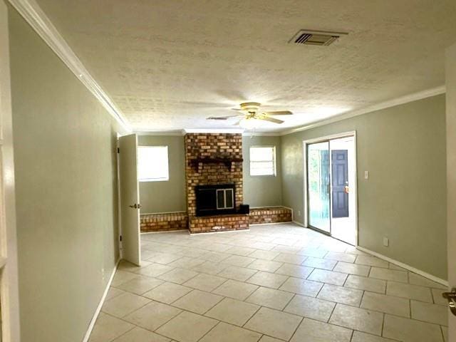 unfurnished living room featuring ceiling fan, plenty of natural light, and ornamental molding