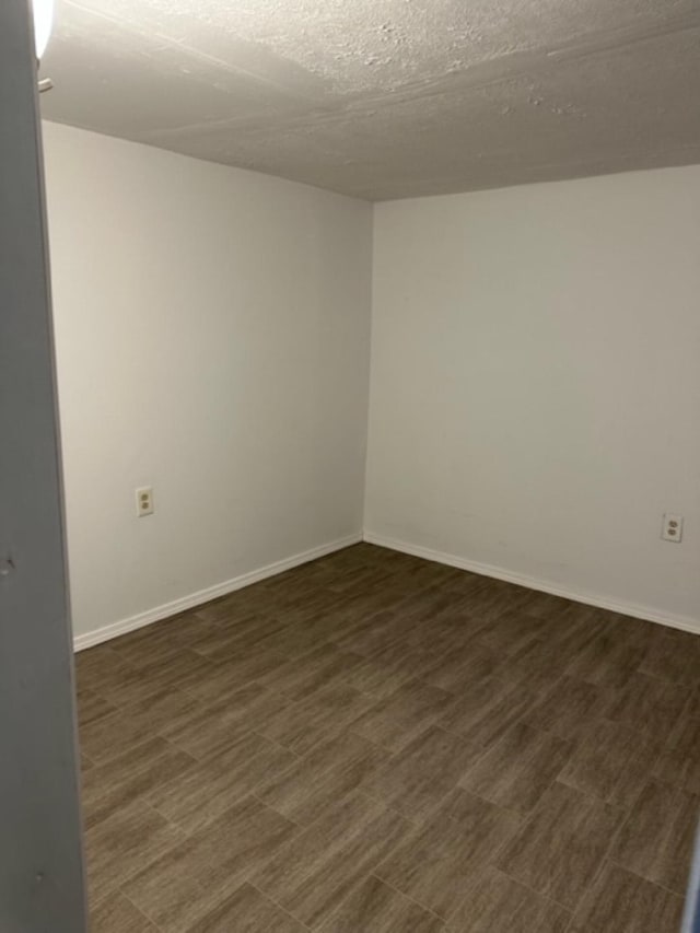 spare room featuring a textured ceiling