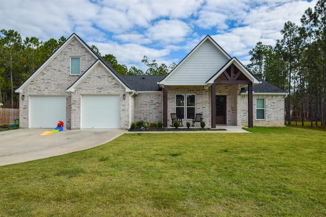 view of front of property featuring a front lawn and a garage