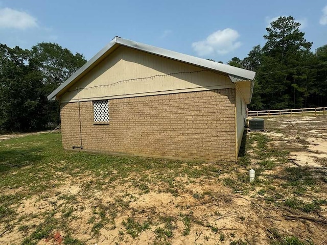 view of home's exterior featuring central air condition unit