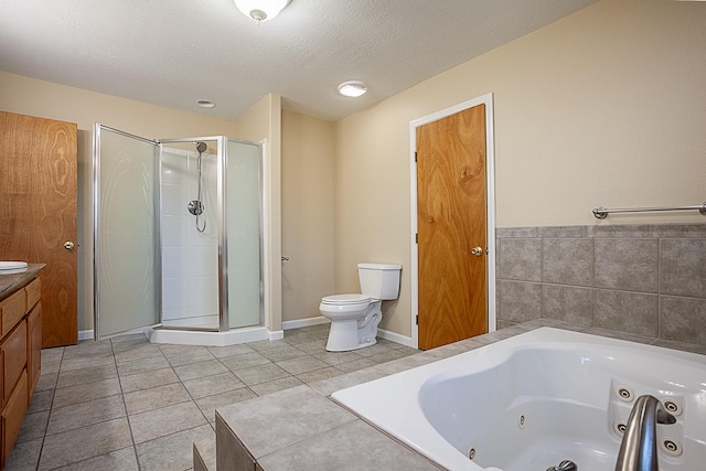 full bathroom with a textured ceiling, toilet, vanity, and tile patterned flooring