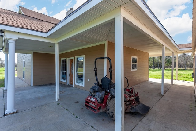 view of patio featuring a carport