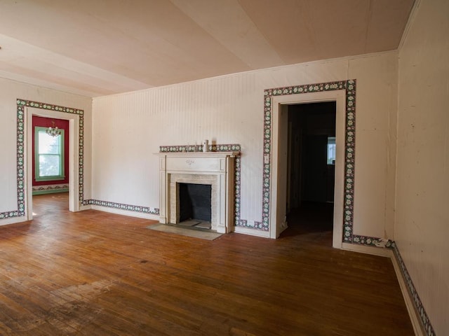 unfurnished living room featuring wood-type flooring