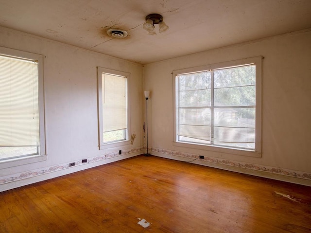 empty room with light hardwood / wood-style floors