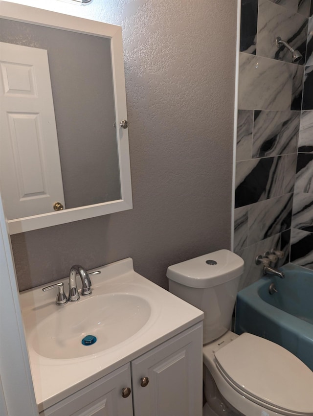 full bathroom with vanity, toilet, and tub / shower combination