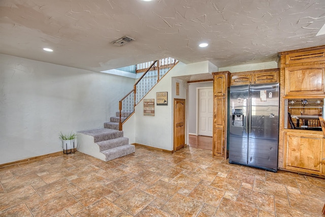 kitchen featuring stainless steel fridge