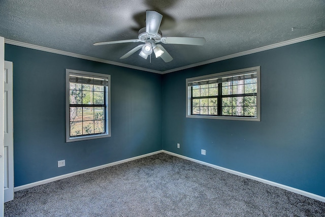 carpeted spare room with ceiling fan, ornamental molding, and a textured ceiling