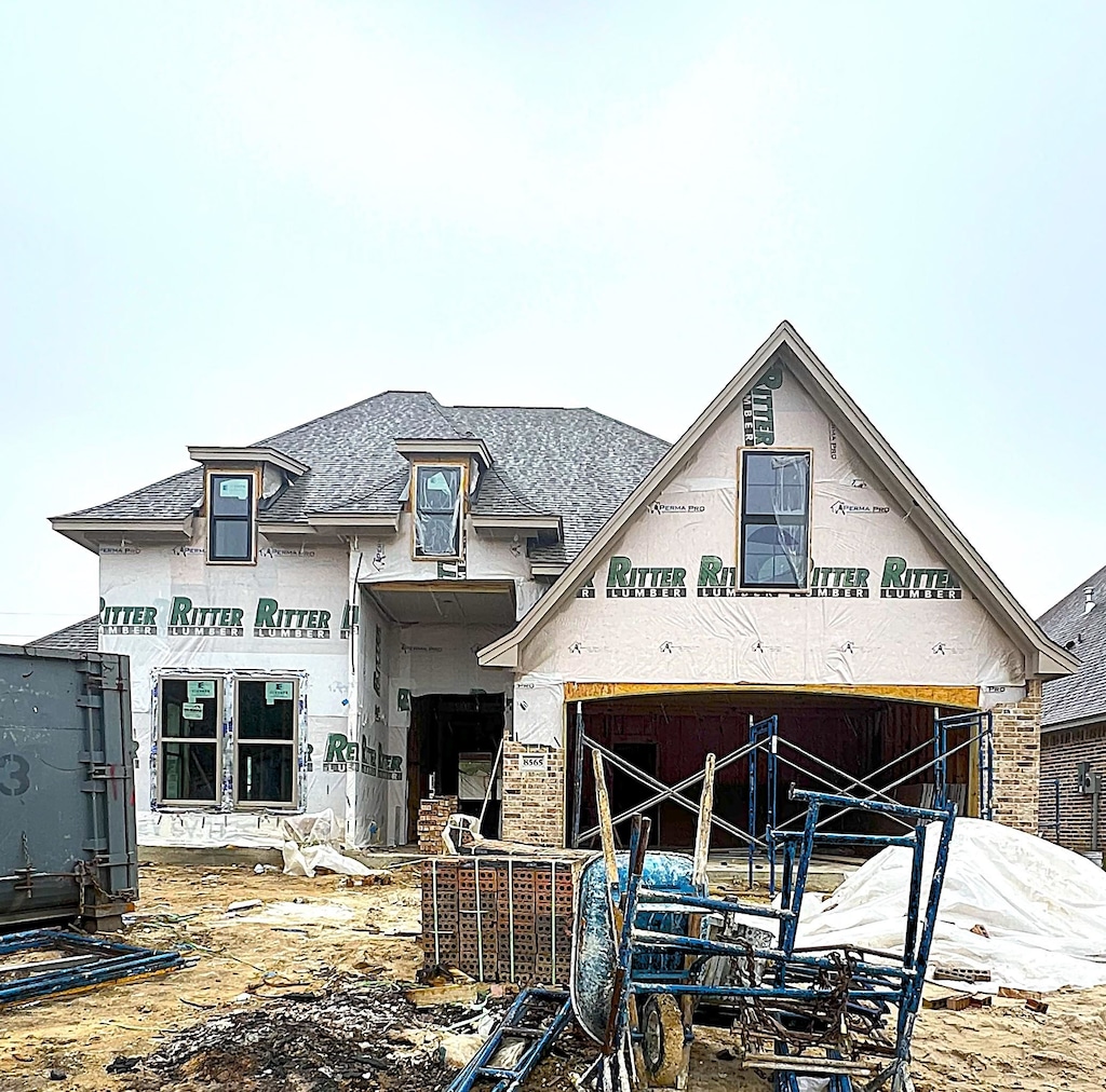 property under construction with a garage